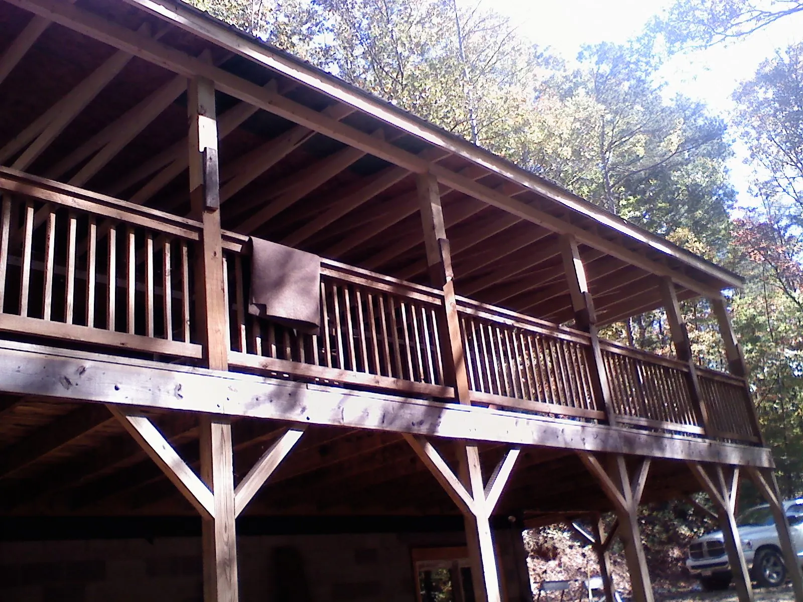 Timber framing under a new elevated porch and deck — Roof Leak Repair in Mendon by Roofing Brothers